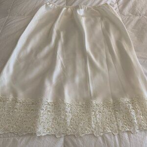Vintage Wacoal Cream Half Slip, about 24 inches long, size M